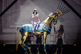 Illustration for article titled Katy Perry's Tour Outfits Are Campy, Sparkly and a Little Insane